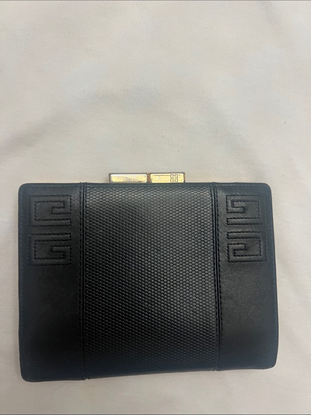 Vintage Givenchy Black Textured Leather Compact Wallet with Gold Closure.